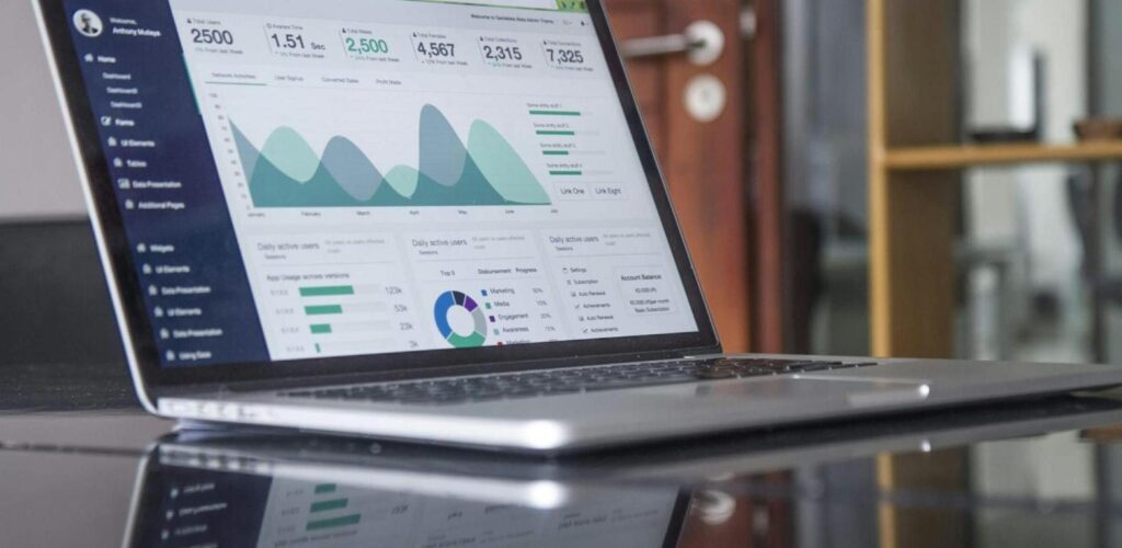 Laptop showing a website analytics dashboard